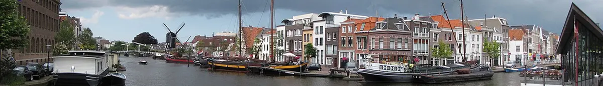 Harbour and windmill in the Netherlands